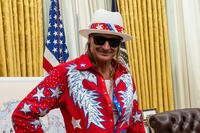Kid Rock stands in the Oval Office as President Donald Trump signs an executive order, March 31, 2025. (Official White House Photo by Molly Riley)